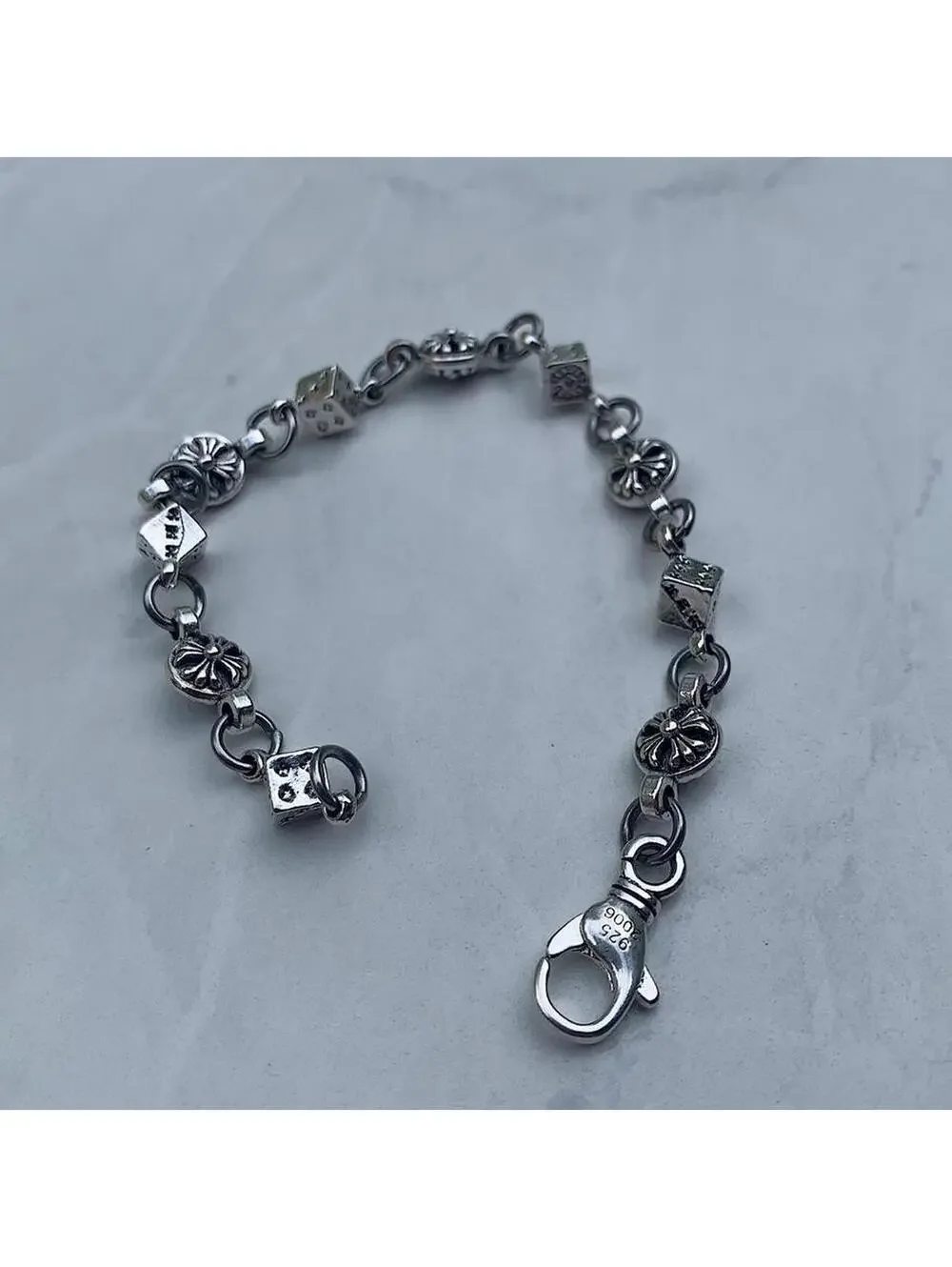Y2k style grunge dice and gothic cross pendant silver punk bracelet. Comes new